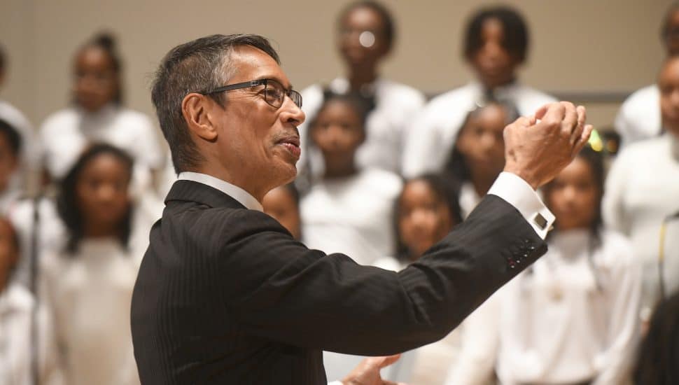 Chester Children's Chorus John Alston conducting a concert.