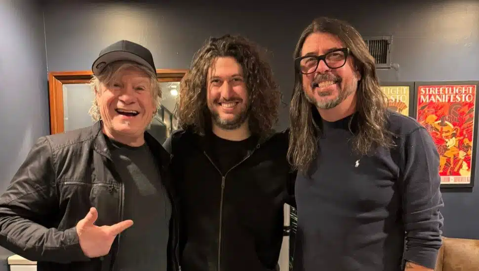 David Uosikkinen, Ilan Rubin, and Dave Grohl backstage.