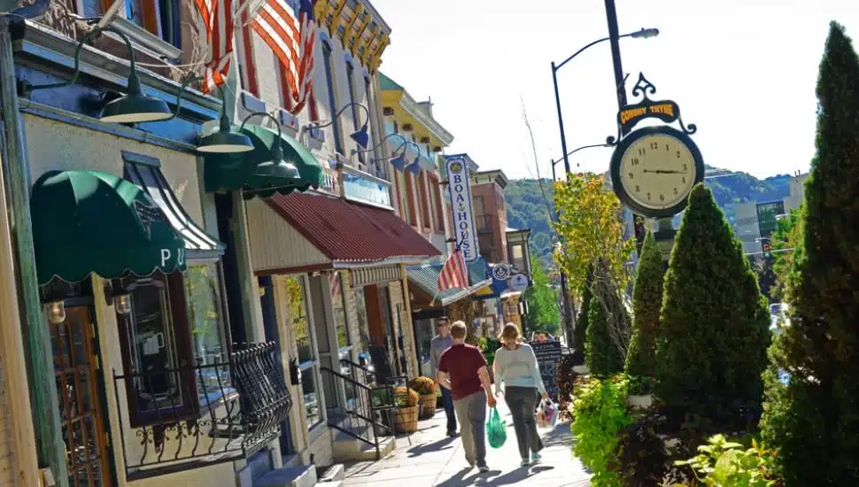 A couple walks down Fayette Street in Conshohocken.