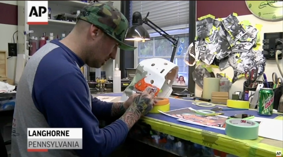 Franny Drummond works on a goalie mask in his Langhorne studio.