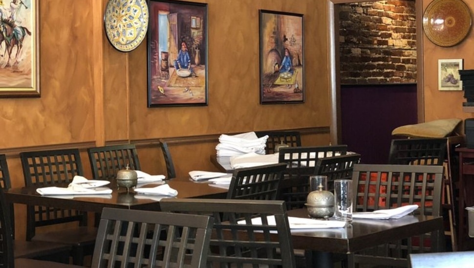 The chairs, tables, and napkins inside Figs.