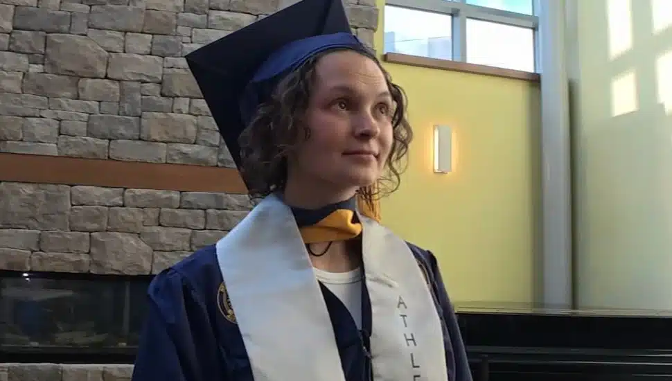 Tammi Keitsock wearing her cap and gown.