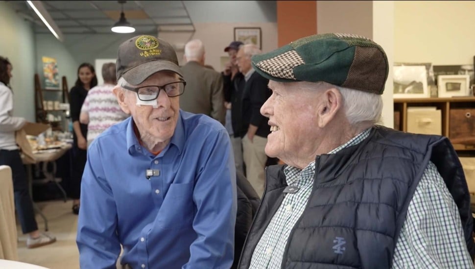 Two seniors chatting during an Irish Diaspora Center Silver to Gold luncheons in Havertown.