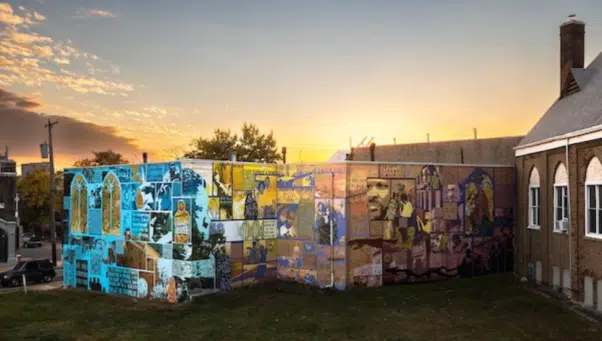 An image of Jane Golden's "Family Interrupted" mural as part of the City of Philadelphia Mural Arts Program (709 West Dauphin Street).